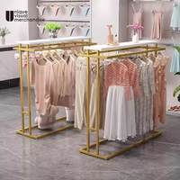 Étagère de présentation en or pour la vente au détail, support en métal et en bois, meubles pour magasin de vêtements, acier et bois avec surface polie, emballé dans un carton
