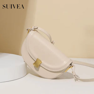 Bolso de mujer de moda francesa de nicho italiano bolso de sillín redondo cien veces hebilla de concha PUFlat crema blanco Mini bolso de hombro con textura - Product Image 2