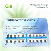 Brackets orthodontiques métalliques monobloc en acier inoxydable, brackets Roth MBT, fournitures dentaires