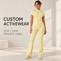 Ensemble de vêtements de sport pour femmes personnalisé, col montant, fermeture éclair intégrale, haut à manches courtes et leggings évasés pour la salle de sport