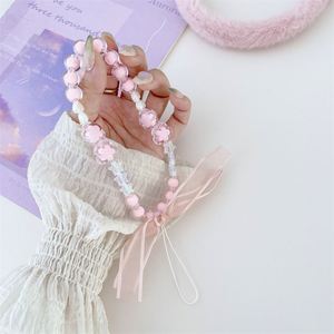 สายคล้องโทรศัพท์มือถือแบบใหม่ สีชมพูสดใส ประดับมุก สายคล้องมือถือถักมือ ใช้ได้กับโทรศัพท์มือถือทุกรุ่น พกพาสะดวก - Product Image 6