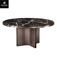 Table à manger ronde en marbre noir de luxe moderne, table à manger pour villa, base en métal incurvée unique, couleurs et dimensions personnalisables
