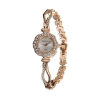 Nouvelle montre-bracelet élégante de style coréen, design croisé, alliage, mouvement à quartz, délicate, tendance, minimaliste pour femme