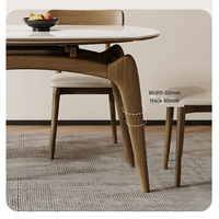 Table à manger extensible ronde en pierre frittée avec plateau en céramique rotatif et mécanisme d'extension en bois