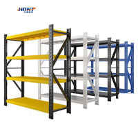 Étagères de stockage d'entrepôt bon marché à 4 niveaux, construction en acier avec optimisation de l'espace pour les marchandises en plusieurs couleurs