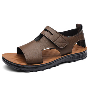 รองเท้าแตะลำลองแบบโรมัน หนังนิ่ม กันลื่น สำหรับผู้ชาย ฤดูร้อน รองเท้าแตะแบบสวมพื้นเรียบ ติดแถบเวลโคร เหมาะสำหรับใส่ชายหาด สีน้ำตาล เทา ดำ - Product Image 5