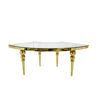Table de luxe moderne en verre en forme de S avec pieds dorés pour hôtel, salon, événements extérieurs et mariages