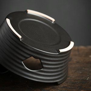 Estufa de camping de hierro fundido, quemador de carbón pequeño, calentador de té portátil para uso en exteriores - Product Image 4