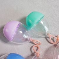 Boîte en plastique portable en forme d'œuf, étui en plastique anti-poussière et respirant, support pour éponge de maquillage avec boucle de suspension pour éponge cosmétique