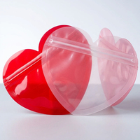 Sac à fermeture éclair en plastique en forme de cœur, résistant à l'humidité, 0,14 mm, avec impression en gravure pour bijoux et petits emballages cadeaux