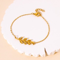 Ensemble collier et bracelet avec pendentif feuille en zircon plaqué or 18 carats en acier inoxydable