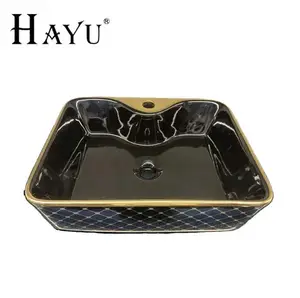 Harga grosir persegi panjang keramik emas bunga wastafel kamar mandi Lavador pulsodak hitam emas berlapis wastafel tangan