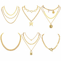 Ensemble de colliers superposés de styles variés avec pendentifs cœur, papillon, pièce de monnaie et cadenas, couleur or et argent, bijoux de mode pour femmes, vente en gros