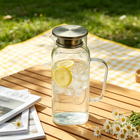 Carafe en verre borosilicate écologique de 1,5 L avec couvercle en acier inoxydable et poignée en verre, résistante à la chaleur, pour boissons chaudes/froides et thé glacé