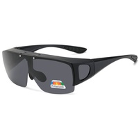 Lunettes de soleil Performance pour hommes et femmes Lunettes de soleil Vision de nuit Film jaune Lentille polarisée à changement de couleur Cadre noir/rouge PC