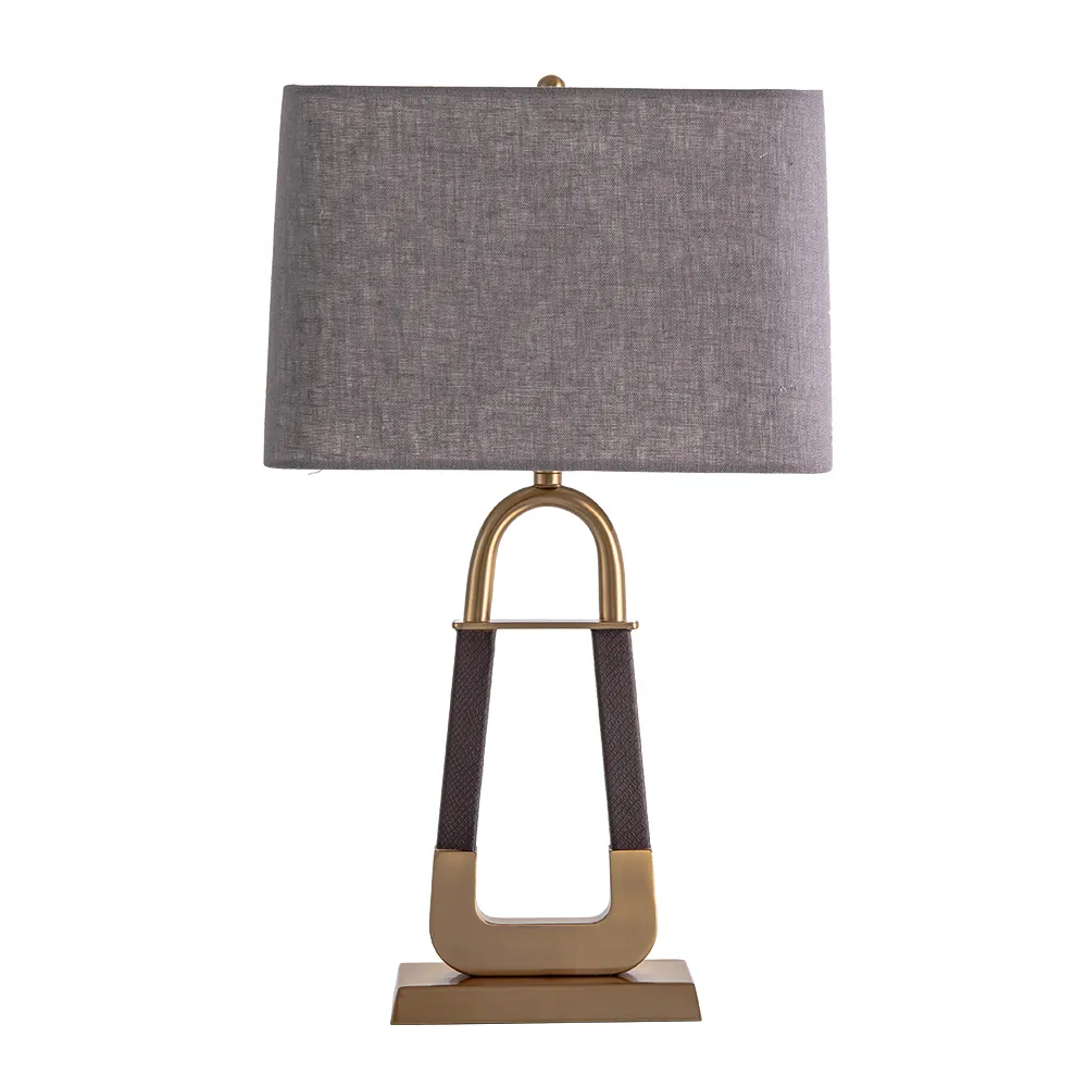 Lampe de table en cuir d'éclairage de décoration intérieure de luxe de chevet d'intérieur postmoderne de haute qualité pour la maison