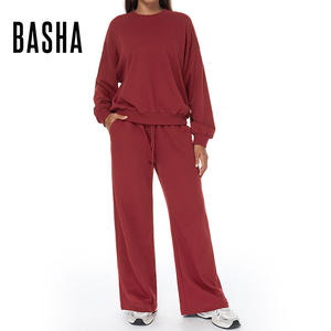 Спортивная одежда с высокой талией и широкими штанинами — это удобная женская рубашка с длинными рукавами, идеально подходящая для бега и занятий в спортзале. - Product Image 1