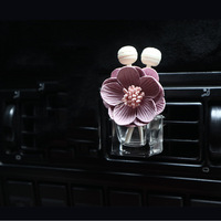 Diffuseur d'air artistique Camellia pour voiture, parfum pour grille d'aération, flacon vide, flacon de parfum floral pour grille d'aération de voiture, clip désodorisant
