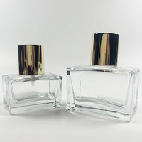 Flacon de parfum rectangulaire de luxe 50 ml en verre, élégant, vide, en cristal, rechargeable pour voyage avec pulvérisateur à pompe