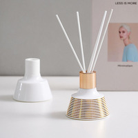 Flacon de parfum blanc de luxe rond, décoration, aromathérapie, vente en gros, contenant en céramique de beauté, diffuseur de parfum à roseaux