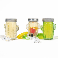 Vente en gros de bouteilles de boisson aux fruits d'orange de 100 ml, bouteille d'eau créative en forme de cactus, bocal en verre avec poignée et couvercle avec paille