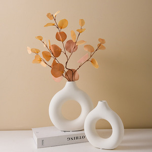 Jarrón de cerámica circular simple para decoración del hogar, artesanías creativas para sala de estar <span class=keywords><strong>con</strong></span> <span class=keywords><strong>flores</strong></span> <span class=keywords><strong>artificiales</strong></span> - Product Image 1