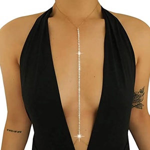 Chaîne de soutien-gorge sexy en cristal avec strass et croix sur la poitrine pour femmes Bikinis à double couche avec harnais décoratif pour les seins et le corps. - Product Image 1