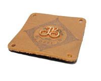 Jeans en cuir véritable personnalisé avec logo en relief personnalisé pour sacs à vêtements chaussures haut de gamme étiquette en cuir véritable personnalisée OEM