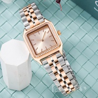 Montre-bracelet analogique de luxe unisexe de haute qualité ODM avec logo et nom personnalisés du client