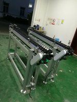 Convoyeurs à chaîne modulaires à entraînement motorisé pour la section d'interface de transfert d'ensembles de pièces usinées en production en série