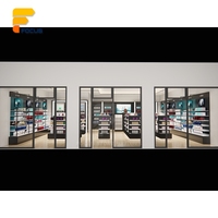 Aménagement de magasin de marque moderne avec présentoirs en verre, comptoir de caisse pour magasin de beauté