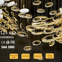Lustre de plafond ovale personnalisable en or blanc pour mariage, design multi-éléments, verre doré, pour projets hôteliers