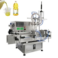Machines de remplissage automatiques à faible coût à 2 têtes pour sauce chili, pâte, shampoing, savon, bouteilles en plastique, jus d'orange, miel, parfum