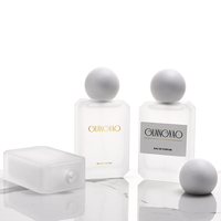 Vente en gros de flacons de parfum en verre vides de luxe personnalisés, 50 ml, flacon en verre givré pour femmes avec bouchon en verre givré
