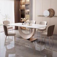 Table à manger extensible en acier inoxydable de style italien ensemble de chaises Design moderne 6 places légères de luxe prêtes pour les mariages de petite taille