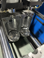 Nouvelle machine de soufflage semi-automatique PLC de petite taille pour bouteilles en PET, fabriquée en Chine