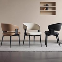 Chaise de salle à manger rembourrée de style italien minimaliste, luxe léger, nordique moderne, avec accoudoirs en acier et mousse haute élasticité pour restaurant