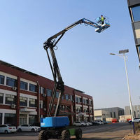 Plateforme élévatrice articulée tout-terrain 4x4 de 18 m avec moteur diesel pour travaux en hauteur