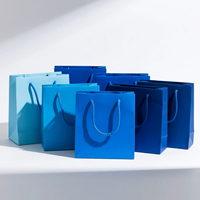 Custom Logo Eco-friendly Durable Paperboard Shopping Bags with Handles for Retail Gift Packaging and Boutique Stores