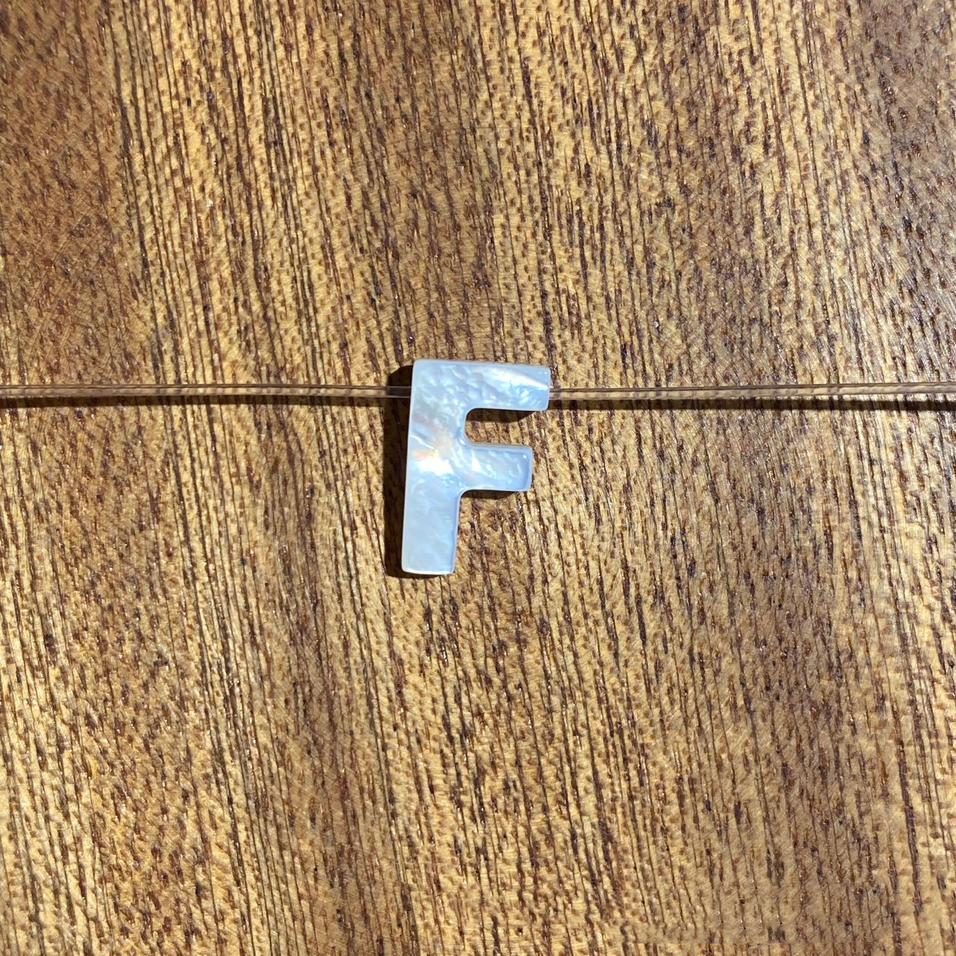 F