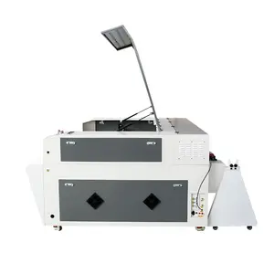Función de alimentación automática Co2 Grabador láser Máquina cortadora de grabado para la fabricación de zapatos