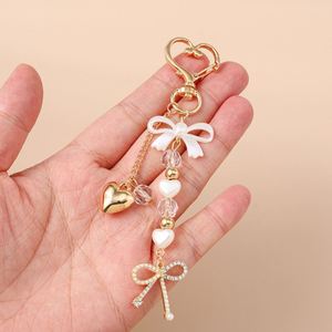 Plastic Resin Pearl Bow Knot <b>Shape</b> Keychain <b>Bag</b> Waterproof Gold <b>Heart</b> Pendant Jewelry Gifts for Women - Product Image 4