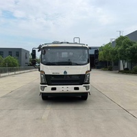 Camion compacteur de déchets Sinotruk HOWO 4x2, véhicule à énergie nouvelle, 10,5 m³, chargement arrière, pour la collecte des déchets