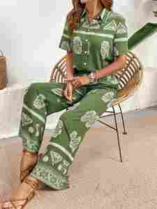 Femmes de haute qualité décontracté imprimé fleuri haut et pantalon long ensemble taille élastique manches courtes été mode tricot tissu - Product Image 2