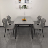 XYBF Ensemble table à manger et chaises de restaurant au design moderne Table en pierre avec finition en marbre Chaise de salle à manger en cuir PU avec pieds en métal italien