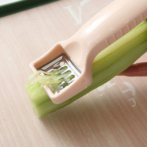 Éplucheur multifonctionnel avec râpe pour l'ail et les légumes, outil de cuisine - Product Image 3