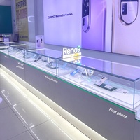Nouvelle vitrine pour téléphones portables avec éclairage LED en verre, fonction lumineuse pour montres et lunettes, rangement multifonctionnel portable doré