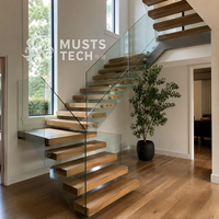 Appartement haut de gamme style minimaliste, fabrication professionnelle, plan de travail, escalier flottant