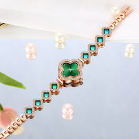 Vente chaude Tiktok Live Streaming Femmes Casual Bracelet En Acier Inoxydable Montre À Quartz Polyvalent Trèfle À Quatre Feuilles Bracelet Uhren
