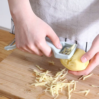 Dubbelzijdige roestvrijstalen aardappel- en groenteschiller, handmatige fruit- en kaasschaaf